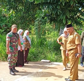 Babinsa Hadiri Kegiatan Penentuan Titik Nol Pembangunan jalan usaha tani