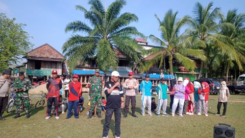 Babinsa Koramil 406-02/Rawas ilir Serma endang Permana menghadiri lomba gerak jalan tingkat SD&SMP di wilayah Binaan