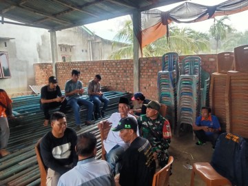 KOPTU EKO WIBOWO DARI KORAMIL 406-02/RAWAS ILIR MELAKSANAKAN GIAT KOMUNIKASI SOSIAL DI DESA KARANG DAPO 1