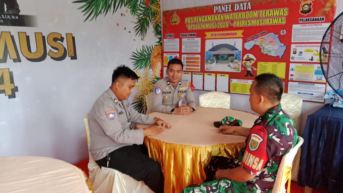 Babinsa Koramil 406-09/Terawas Laksanakan Pengamanan Natal dan Tahun Baru di Objek Wisata Waterboom
